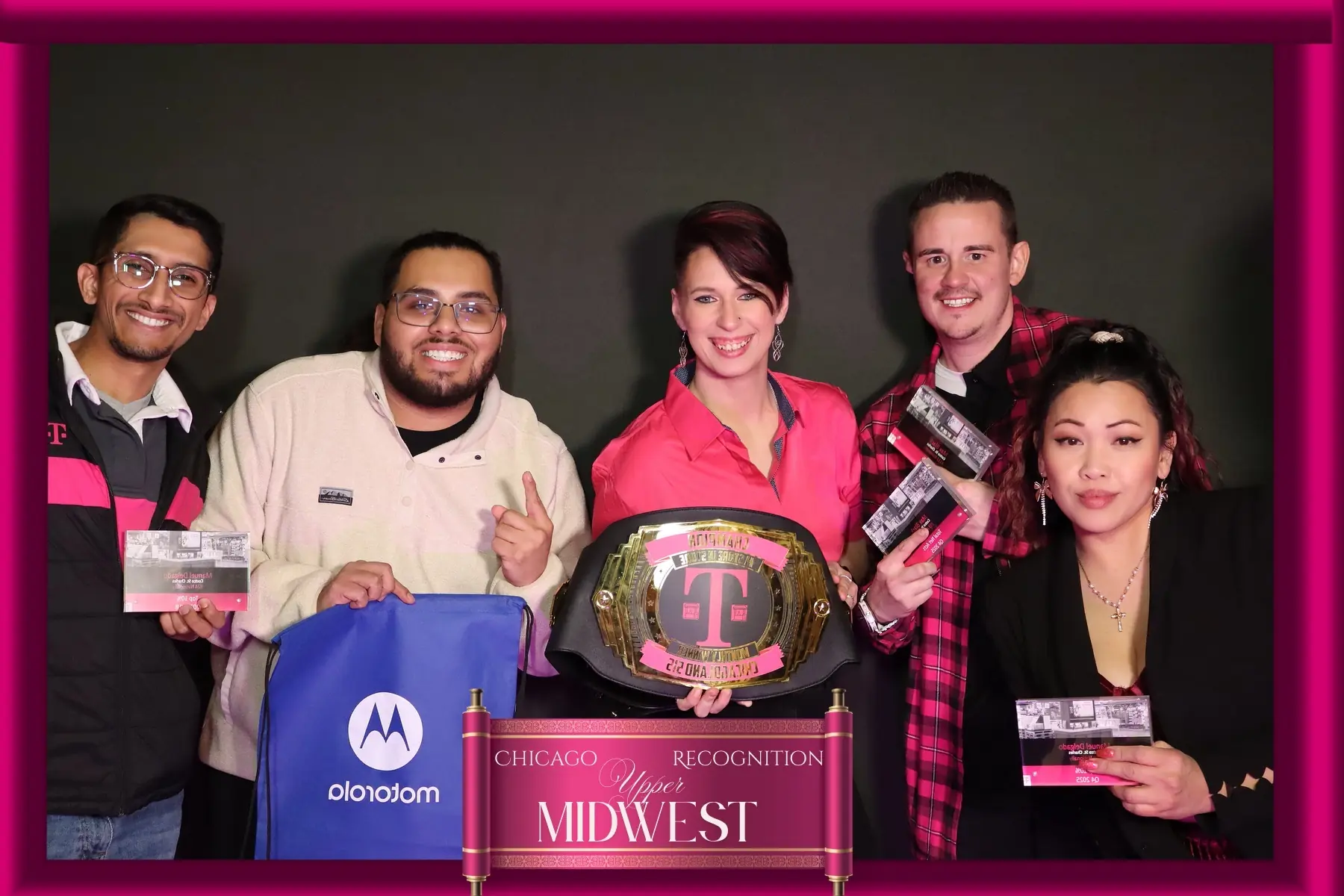 Recognition winners with a custom magenta event frame by Images & Creations