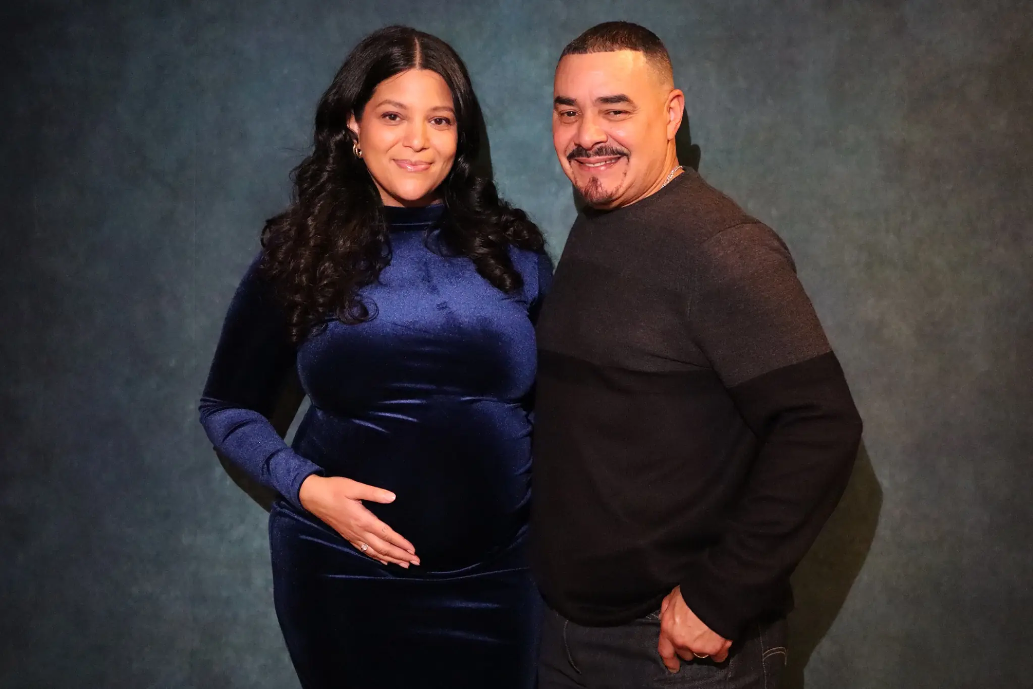 Parents-to-be photographed together at their baby shower