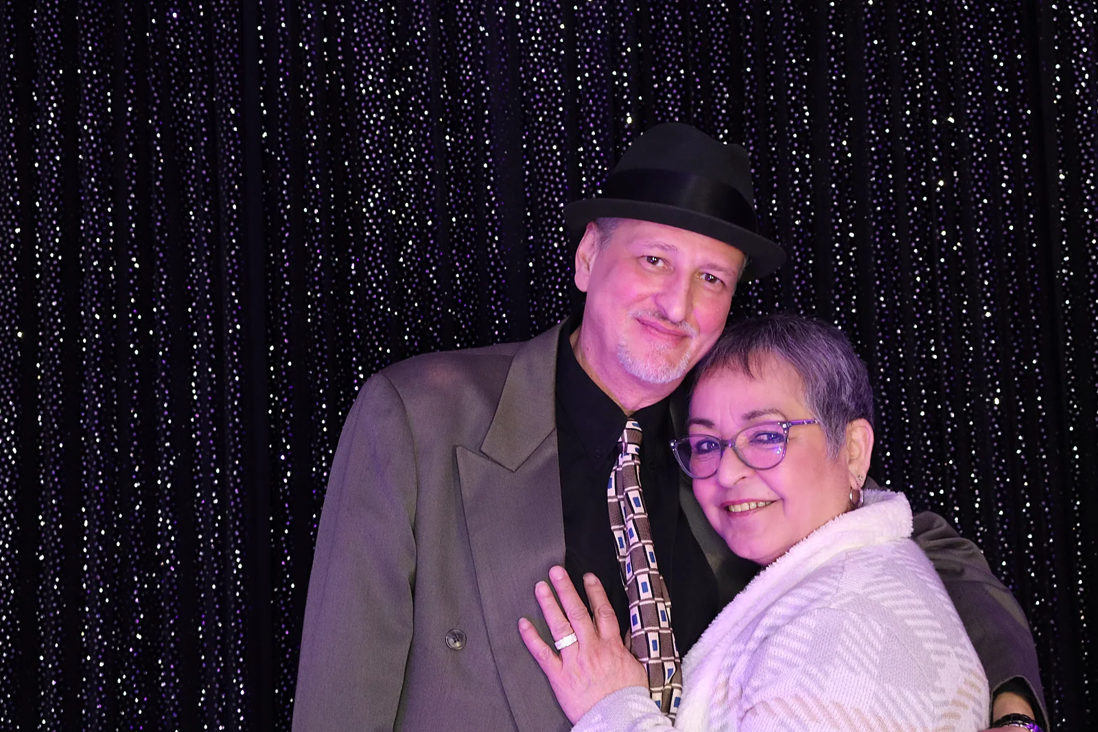 Two guests smiling together at Jayla’s quinceañera by Images & Creations