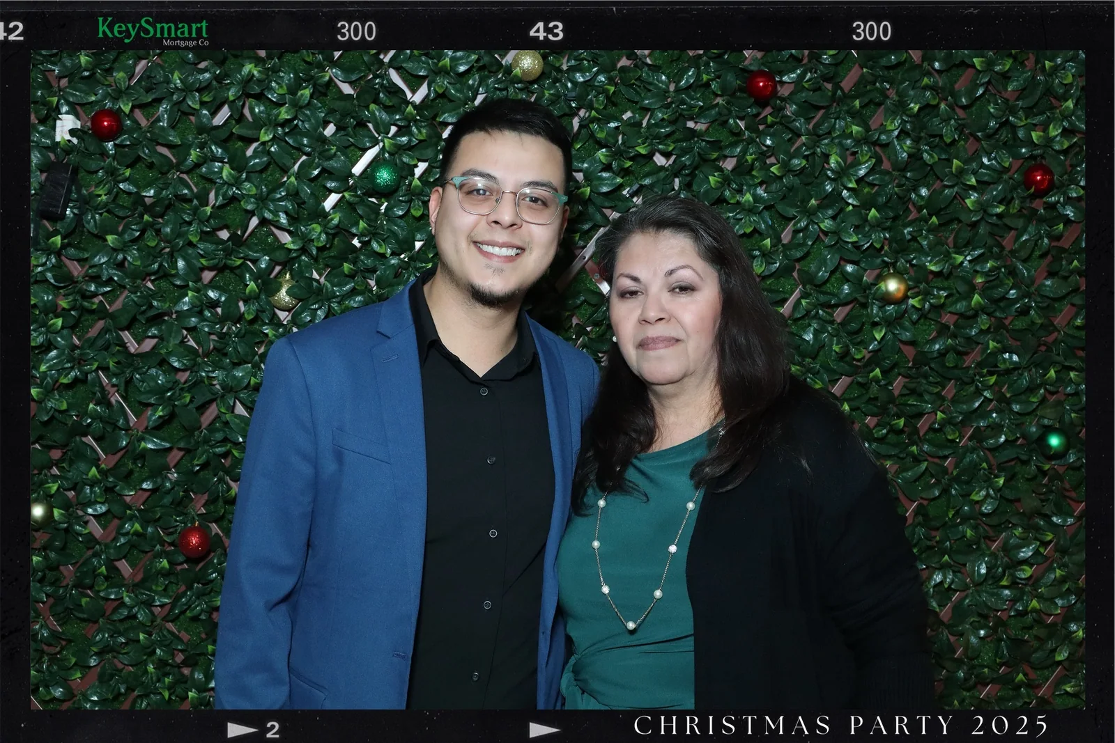 Family portrait inside a custom KeySmart holiday photo frame by Images & Creations