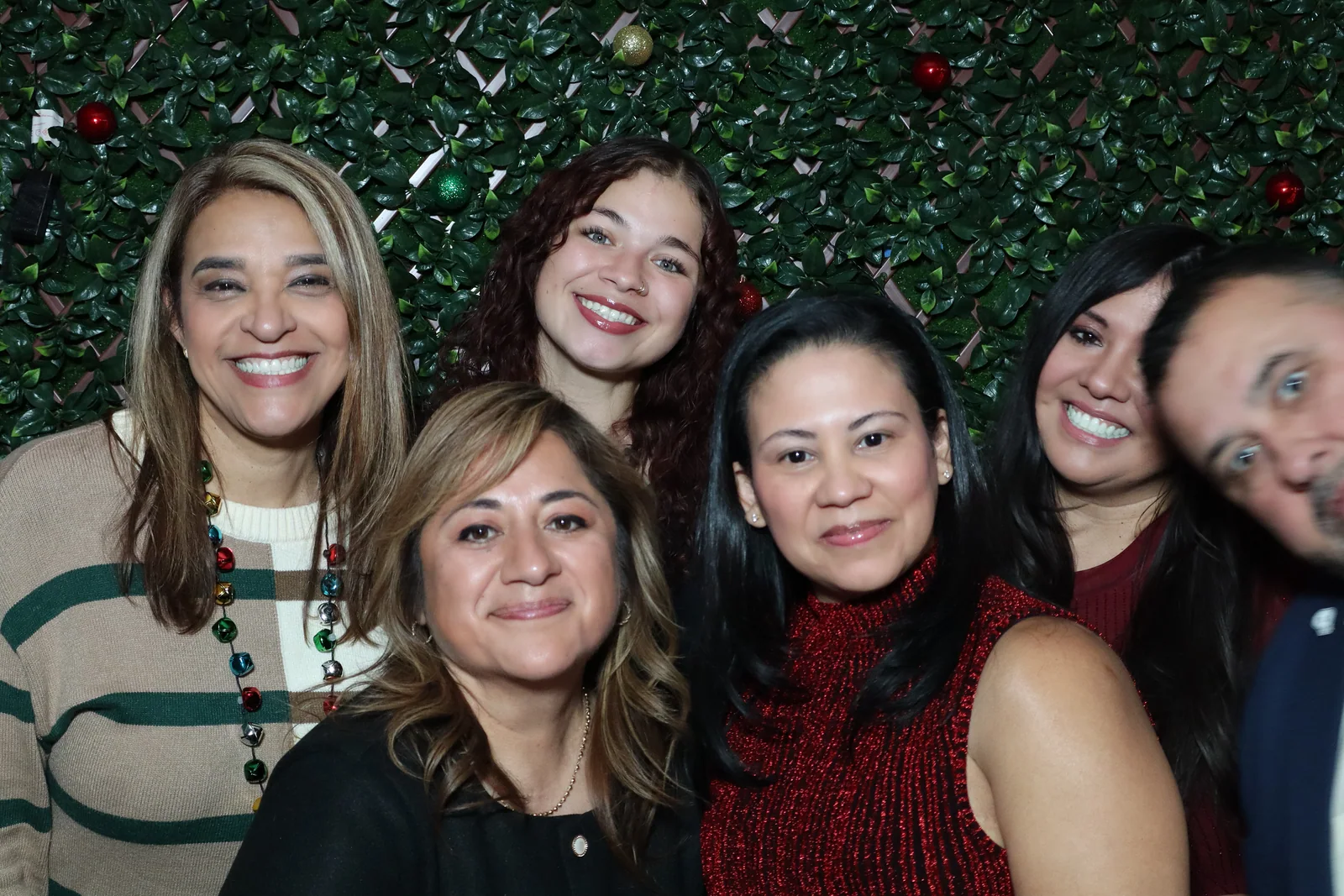 KeySmart team members smiling together at their Chicago holiday party