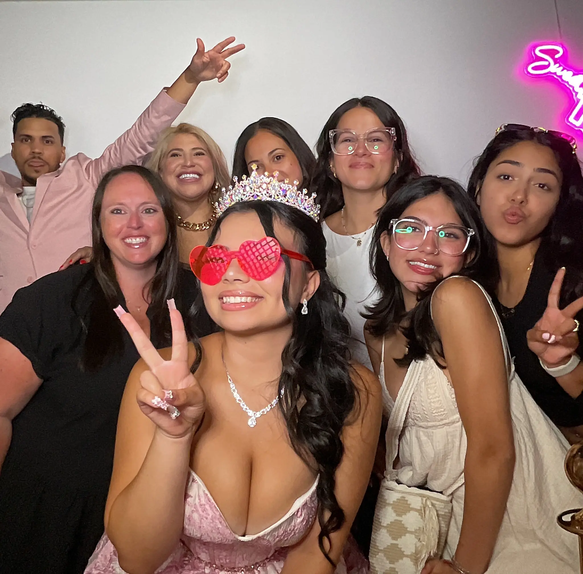 Maleah surrounded by guests at her Sweet 16 celebration by Images & Creations