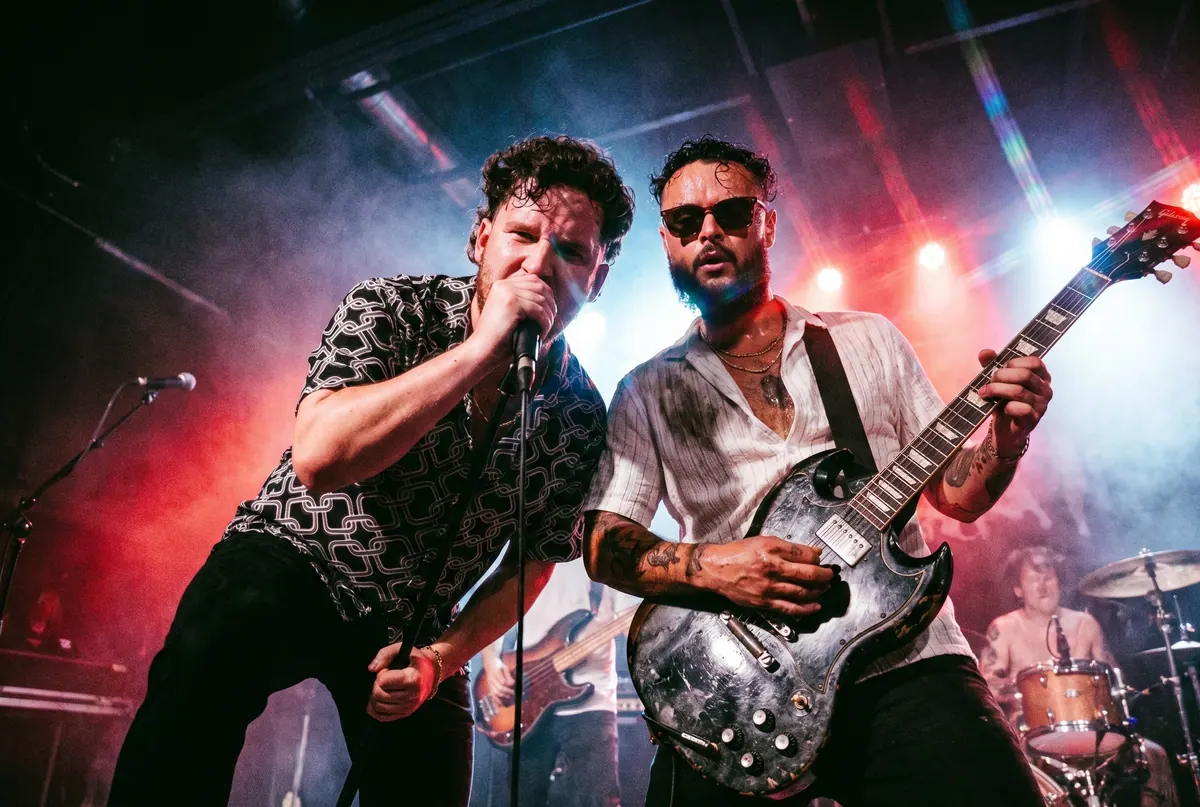 Guests transformed into rock performers on a concert stage